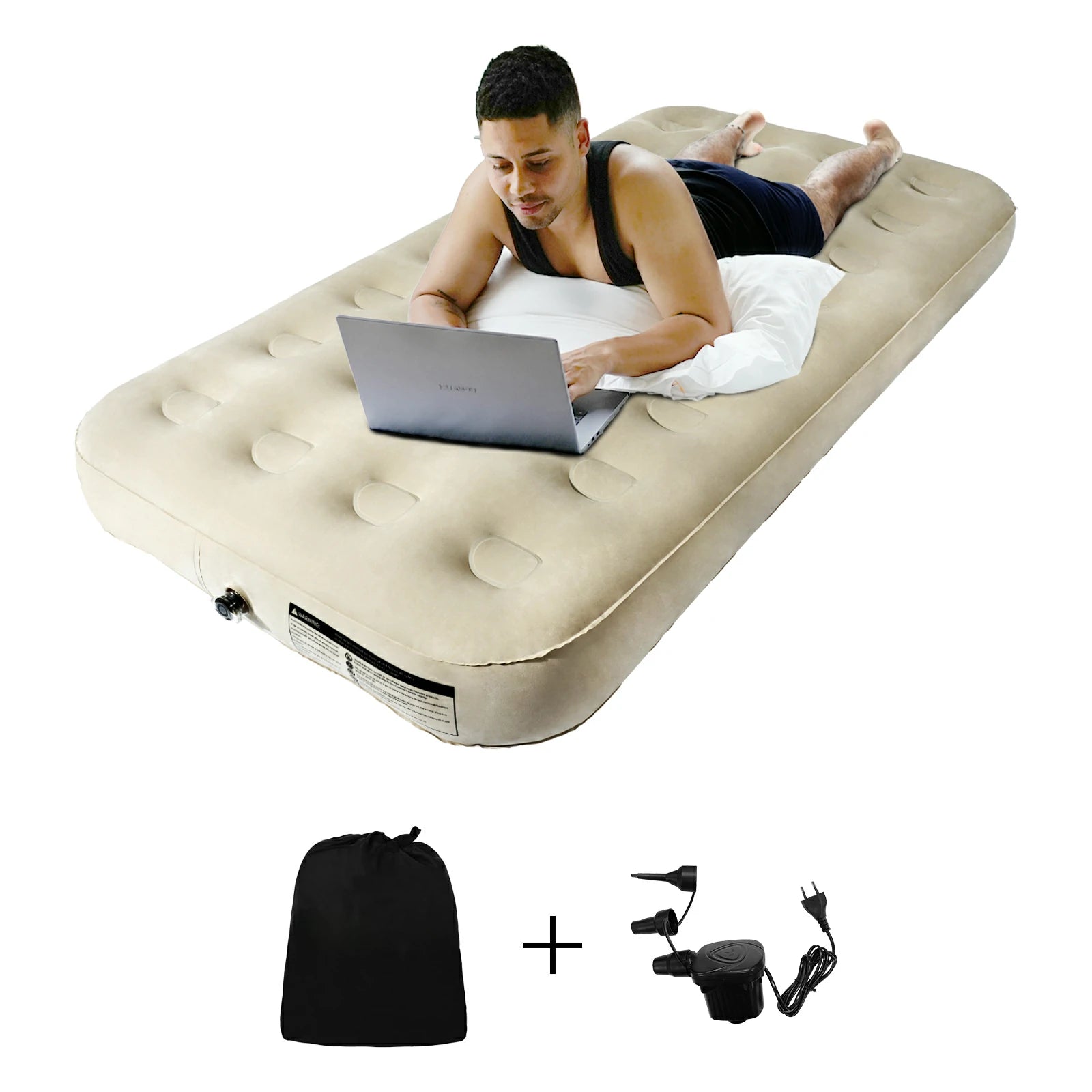 Man using laptop while lying on inflatable air mattress.