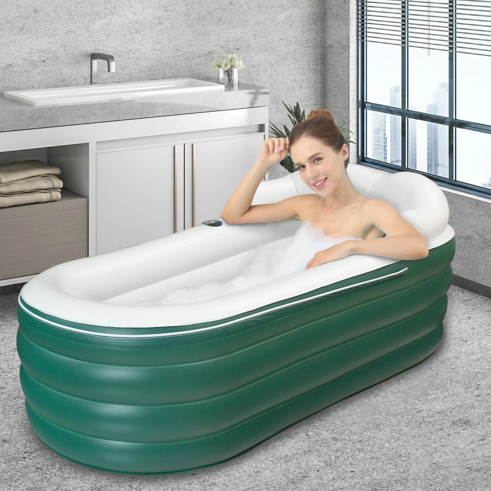 Comfortable inflatable bath with supportive backrest